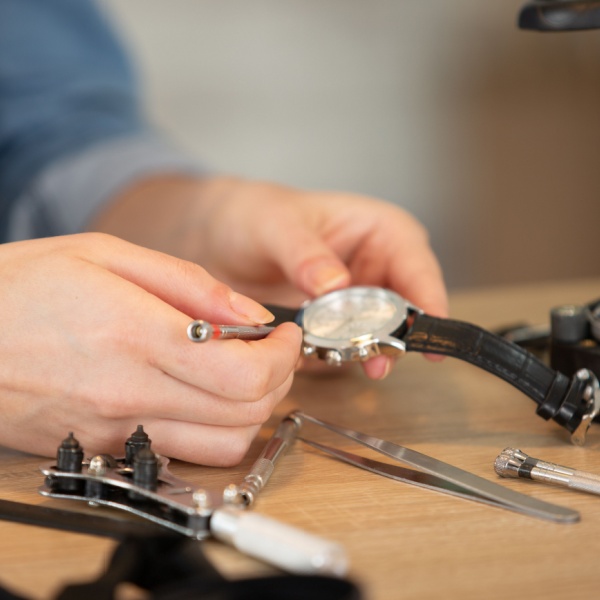 A man repairing a watch.